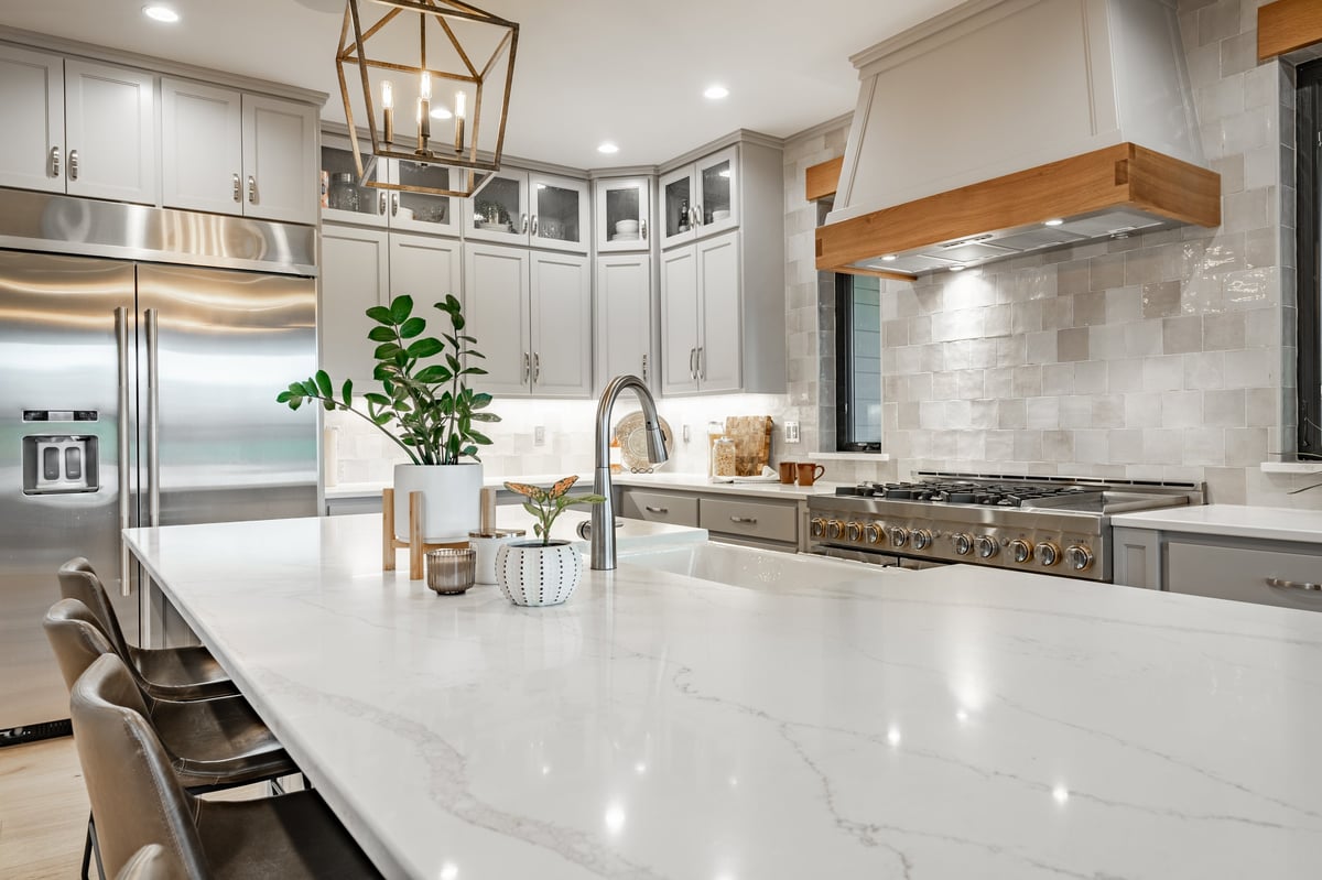Bright, spotless white kitchen with natural light in a Little Rock home