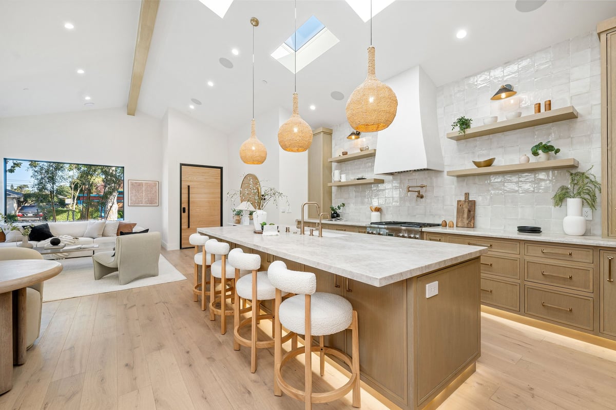 Tidy modern kitchen with wooden cabinets and island after a standard cleaning